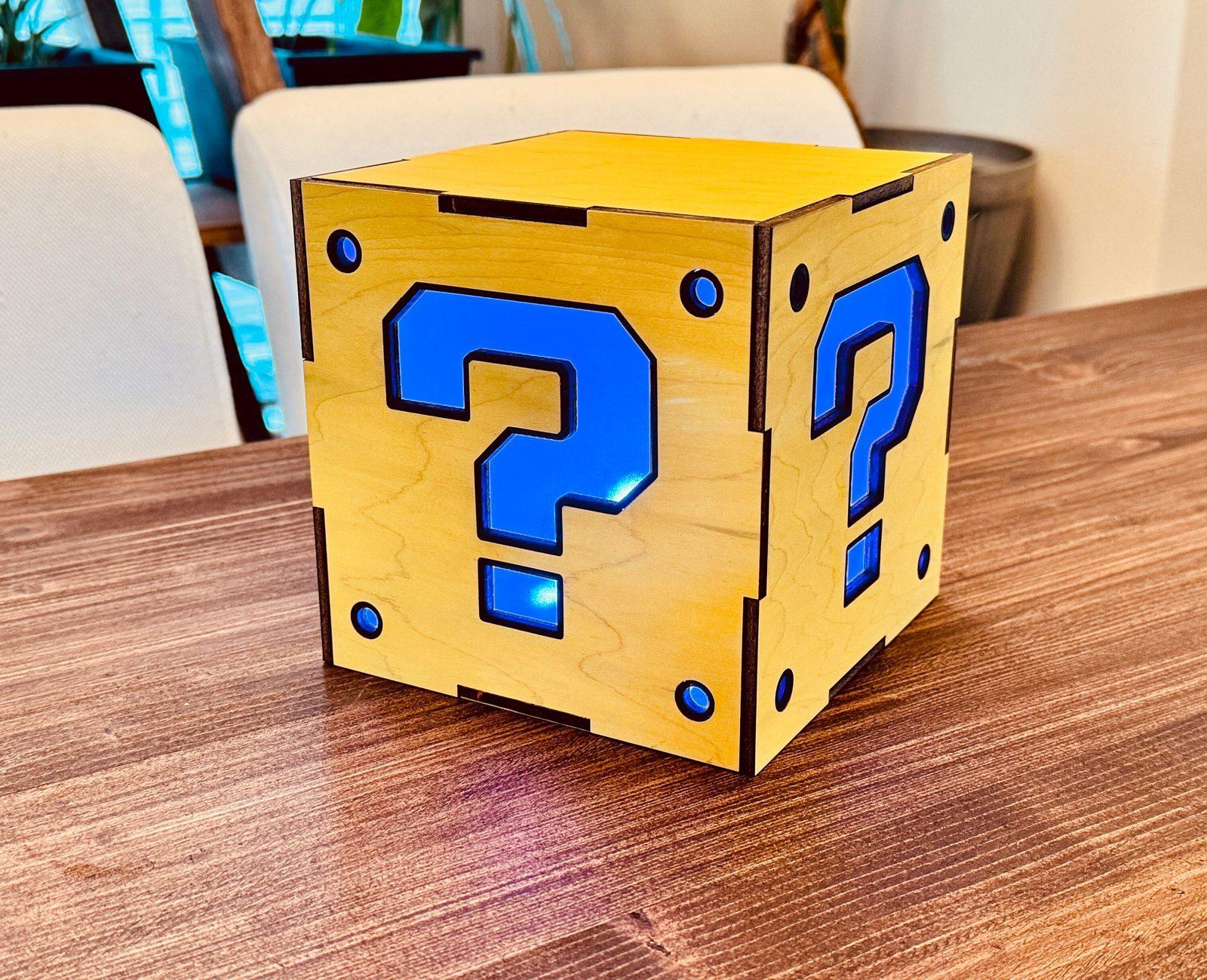 Question block lamp lit up in a dark room