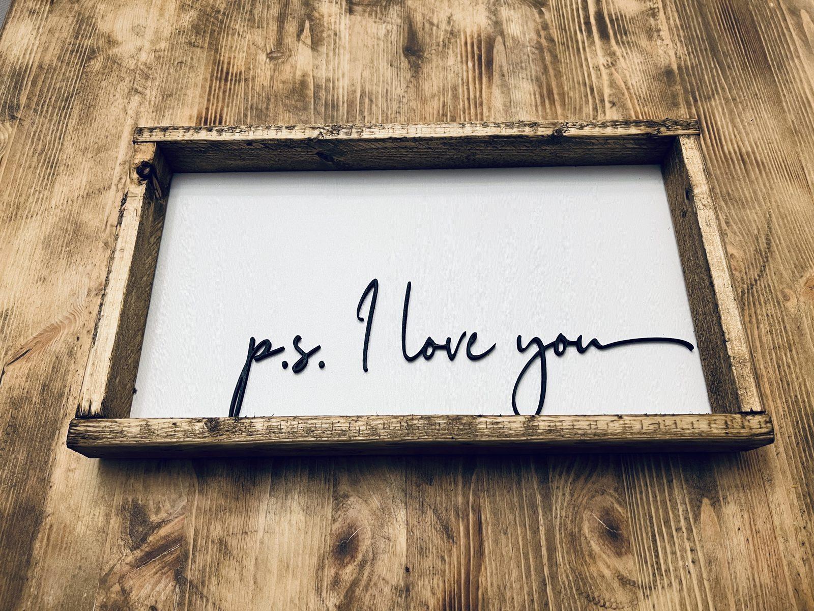 PS I Love You sign displayed on a wall